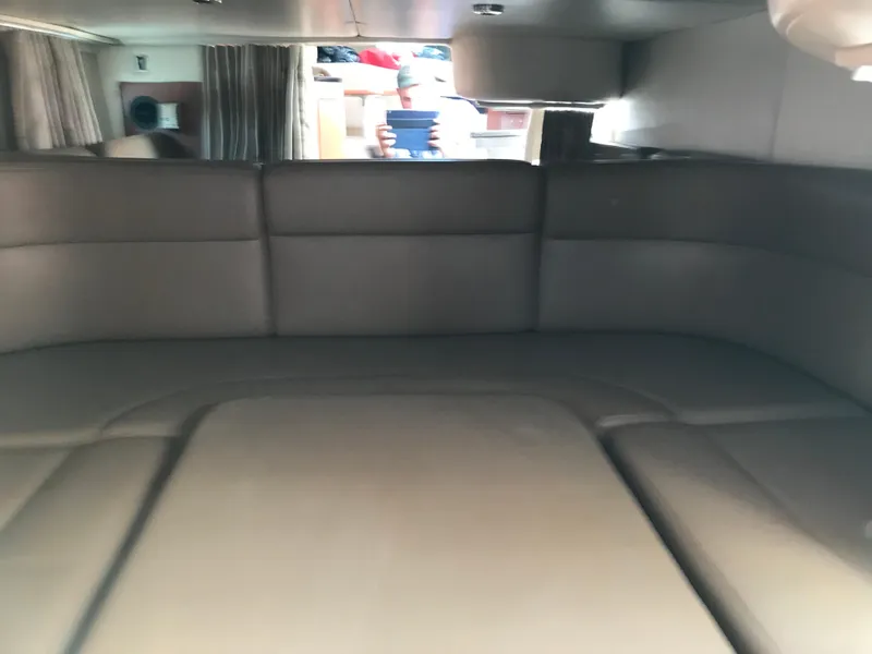 Slide: The Image of Interior cabin of 2002 Chaparral Signature 300 boat with leather seating. - 27