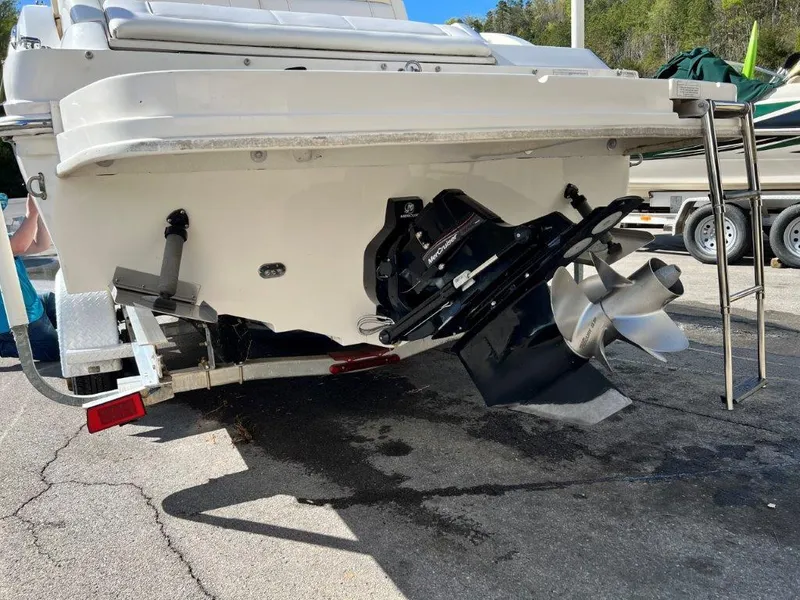 Slide: The Image of 2013 Sea Ray 260 Sundeck boat stern with propeller and ladder. - 5