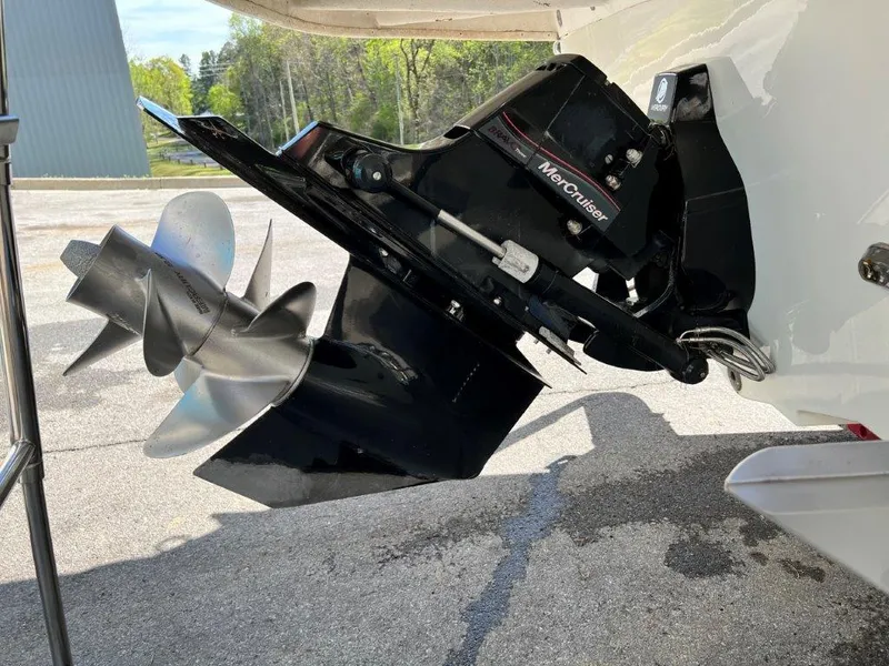 Slide: The Image of 2013 Sea Ray 260 Sundeck with MerCruiser outdrive and stainless steel propeller. - 6
