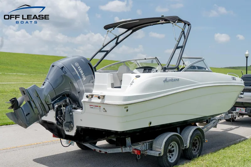 Slide: The Image of 2020 Hurricane 217 SD boat on trailer with Yamaha outboard motor. - 7
