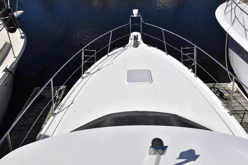 Slide: The Image of Top view of 1999 Carver 356 Aft Cabin yacht docked at marina. - 3