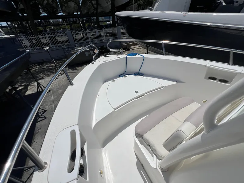 Slide: The Image of 2009 Everglades 210CC boat interior, featuring seating and storage compartments. - 1