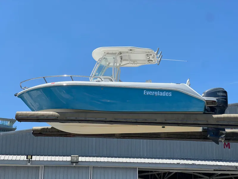 Slide: The Image of 2009 Everglades 210CC boat with Yamaha engine on lift. - 4