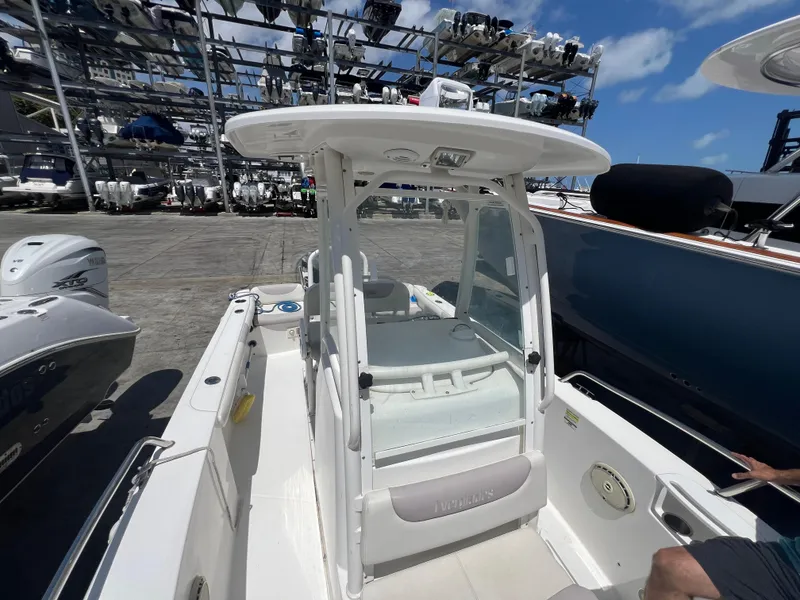Slide: The Image of 2009 Everglades 210CC center console boat in a marina storage facility. - 6