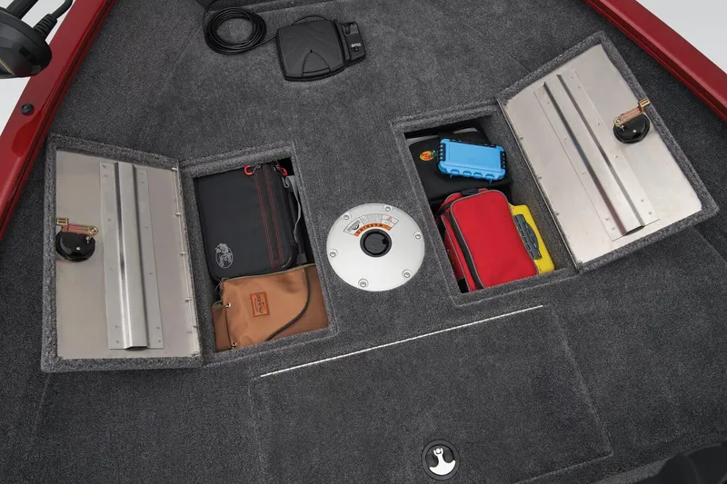 Slide: The Image of 2025 Tracker Super Guide V-16 SC boat storage compartments with various gear. - 11