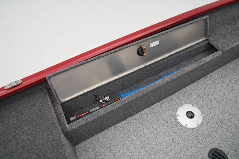 Slide: The Image of 2025 Tracker Super Guide V-16 SC boat storage compartment with fishing rod holders. - 20