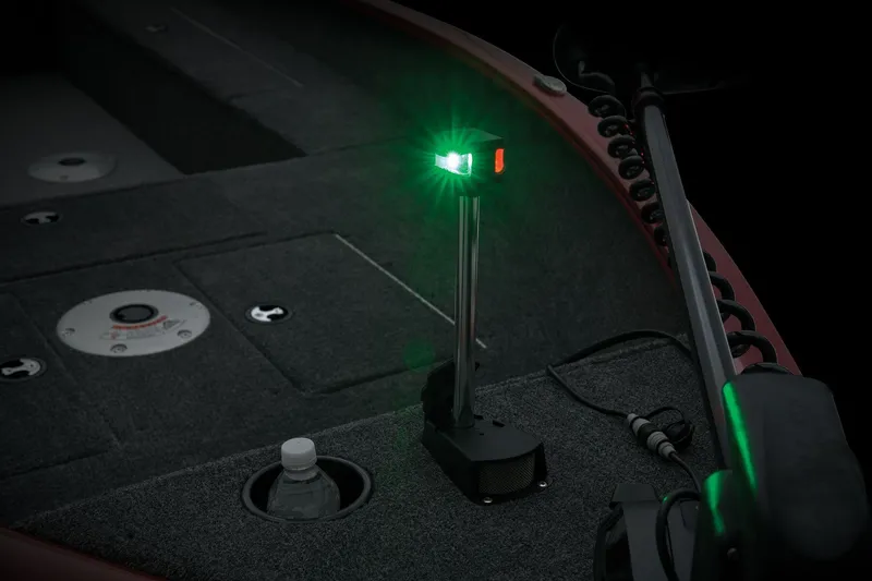 Slide: The Image of 2025 Tracker Super Guide V-16 SC boat interior with navigation light. - 9