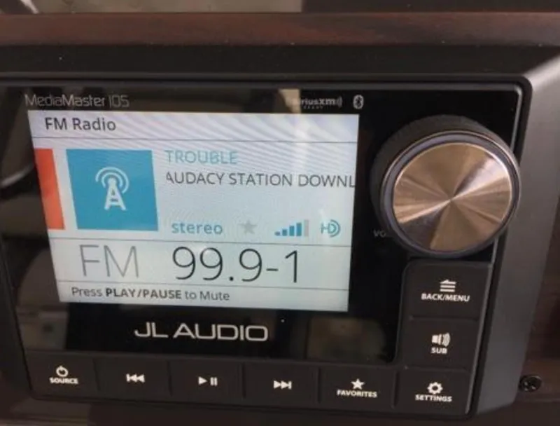 Slide: The Image of JL Audio MediaMaster 105 radio display in 2022 Pursuit S 428 Sport boat. - 14