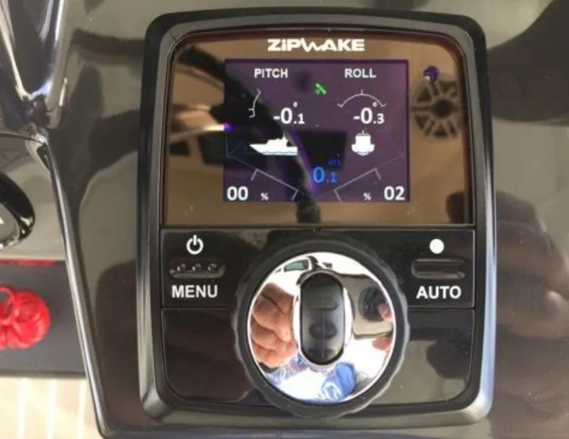 Slide: The Image of Close-up of Zipwake control panel on 2022 Pursuit S 428 Sport boat. - 15
