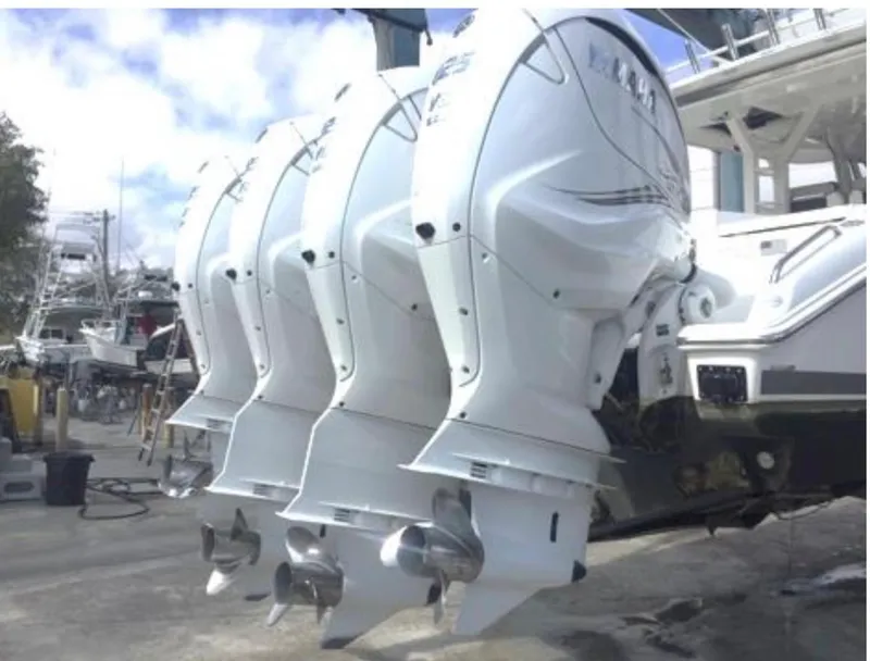 Slide: The Image of 2022 Pursuit S 428 Sport boat with four powerful outboard engines. - 4