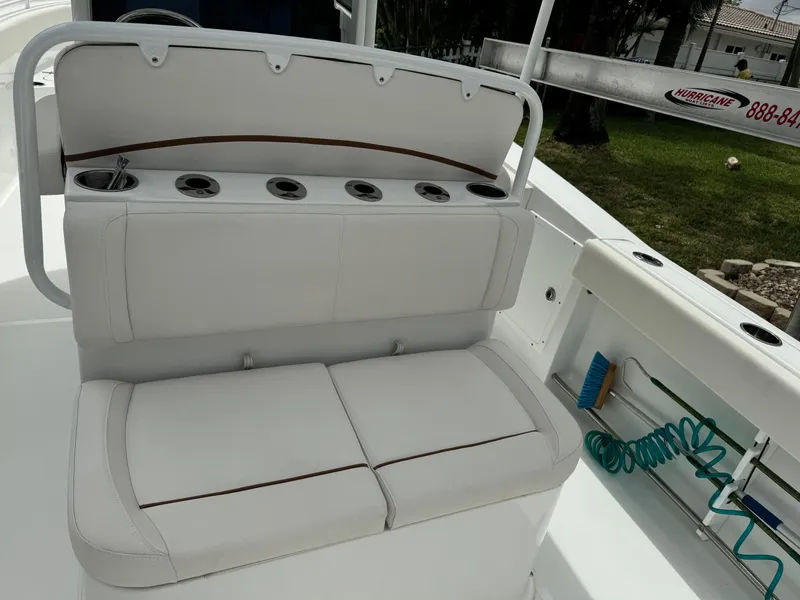Slide: The Image of 2022 Sea Hunt 27 Gamefish boat seating and rod holders. - 11