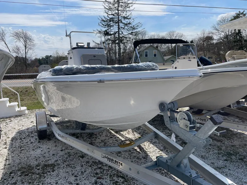 Slide: The Image of 2024 Sea Pro 202 Center Console boat on a trailer, ready for adventure. - 0