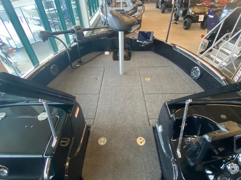Slide: The Image of 2024 Nitro ZV19 Sport Pro boat interior with seating and control panel. - 5