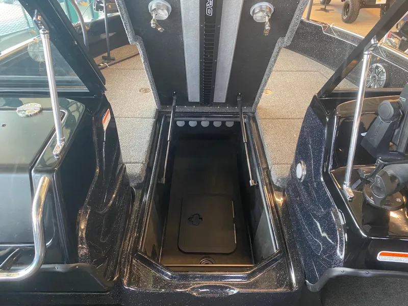 Slide: The Image of 2024 Nitro ZV19 Sport Pro boat storage compartment, open and empty. - 7