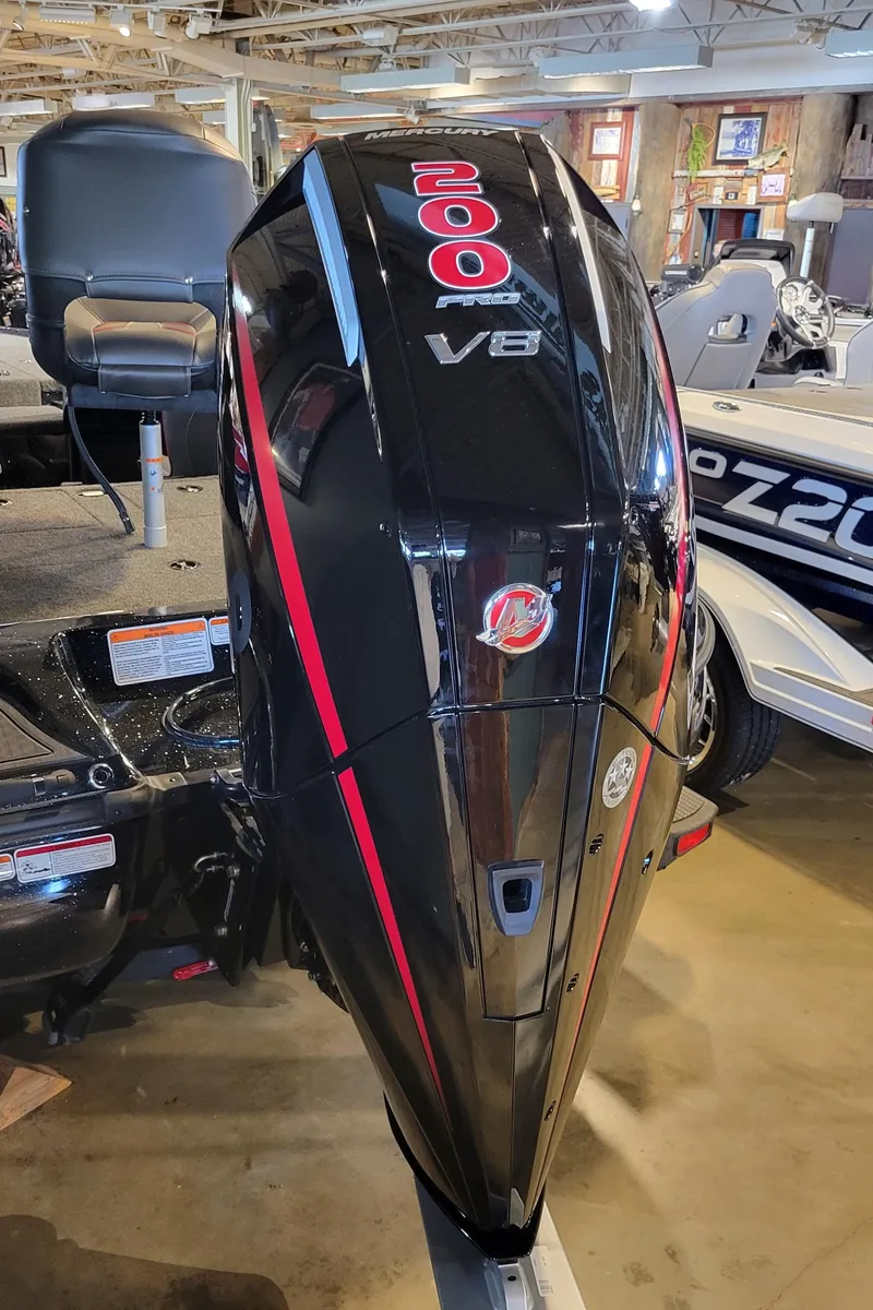 Slide: The Image of 2024 Nitro Z19 boat with powerful 200 Pro V8 engine in showroom. - 6