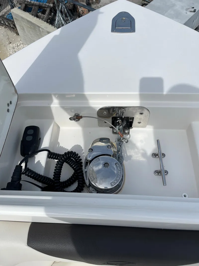 Slide: The Image of Anchor storage compartment on a 2023 Sailfish 290 CC boat. - 19
