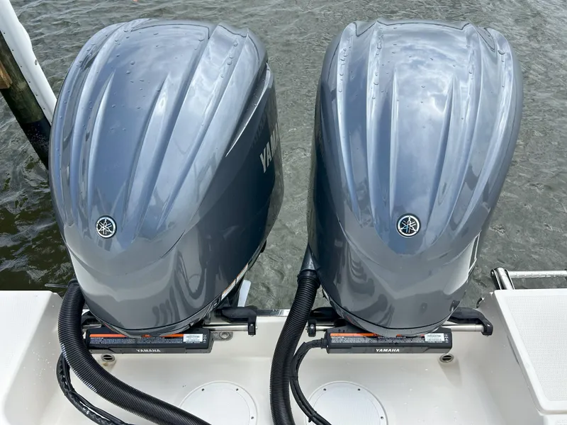 Slide: The Image of Twin Yamaha outboard engines on a 2023 Sailfish 290 CC boat. - 3