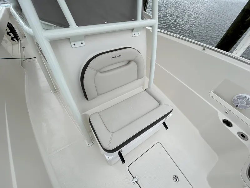 Slide: The Image of 2023 Sailfish 290 CC boat seat and deck area. - 44