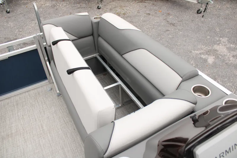 Slide: The Image of 2024 Avalon VENTURE QUAD LOUNGER boat seating with cup holders and storage. - 10