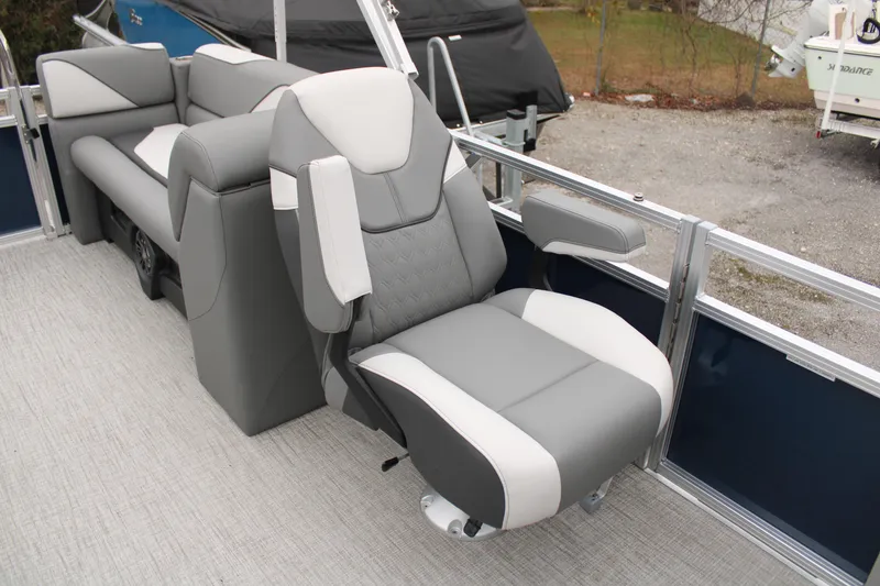 Slide: The Image of 2024 Avalon VENTURE QUAD LOUNGER boat with luxurious seating and modern design. - 14