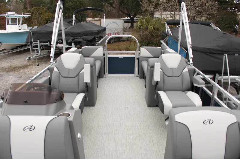 Slide: The Image of 2024 Avalon VENTURE QUAD LOUNGER pontoon boat with spacious seating and modern design. - 15