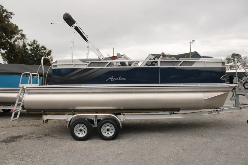 Slide: The Image of 2024 Avalon VENTURE QUAD LOUNGER pontoon boat on a trailer. - 4