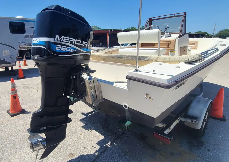 Slide: The Image of 1988 Mako 20 Center Console boat with Mercury 250 EFI outboard motor. - 25
