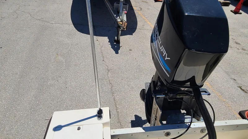 Slide: The Image of 1988 Mako 20 Center Console boat with outboard motor in parking lot. - 27