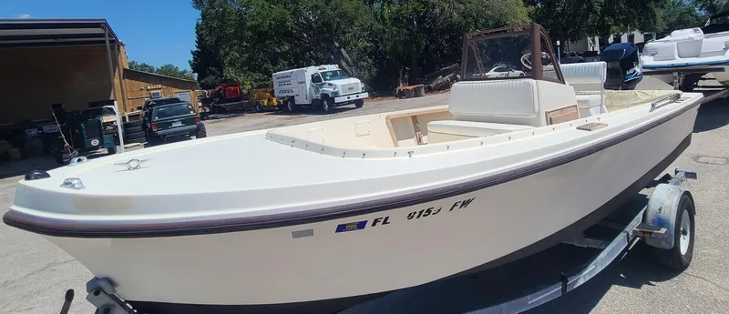 Slide: The Image of 1988 Mako 20 Center Console boat on trailer in outdoor lot. - 7