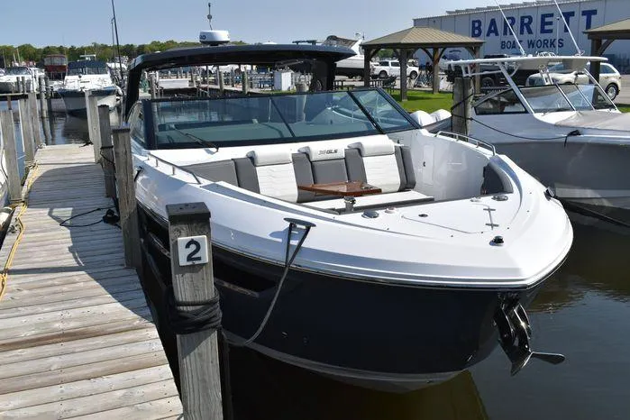 Slide: The Image of 2023 Cruisers Yachts 38 GLS OB docked at marina. - 2