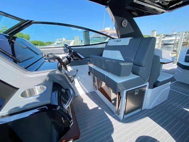 Slide: The Image of 2023 Cruisers Yachts 38 GLS OB cockpit with modern helm and seating. - 4