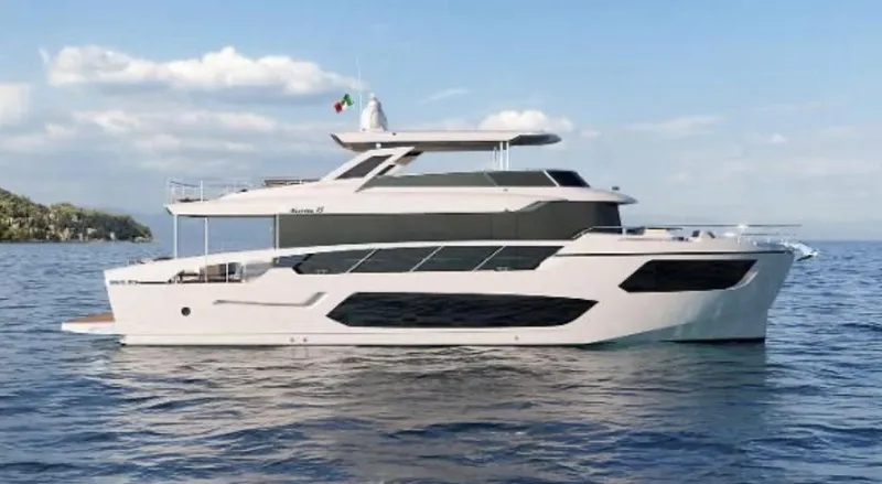 Slide: The Image of 2025 Absolute NAVETTA 75 yacht cruising on open water under a clear sky. - 2