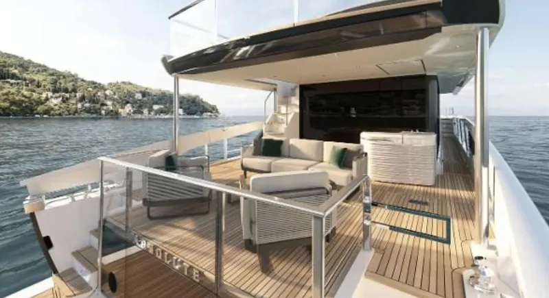 Slide: The Image of Luxurious 2025 Absolute NAVETTA 75 yacht deck with modern seating and scenic ocean view. - 6