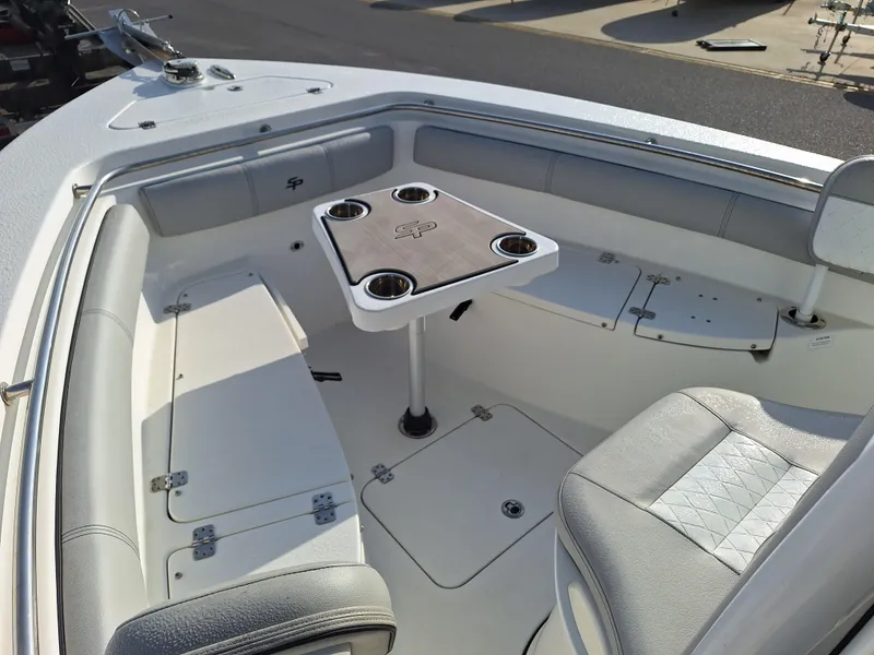 Slide: The Image of 2020 Sea Pro 219 Center Console boat interior with seating and table. - 6