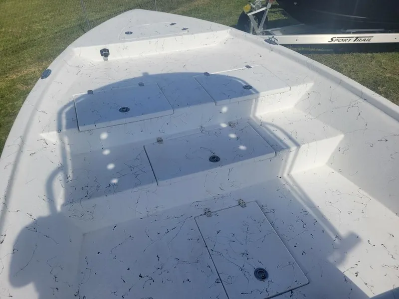 Slide: The Image of 2024 Blazer Bay 2400 boat console with steering wheel and controls. - 9