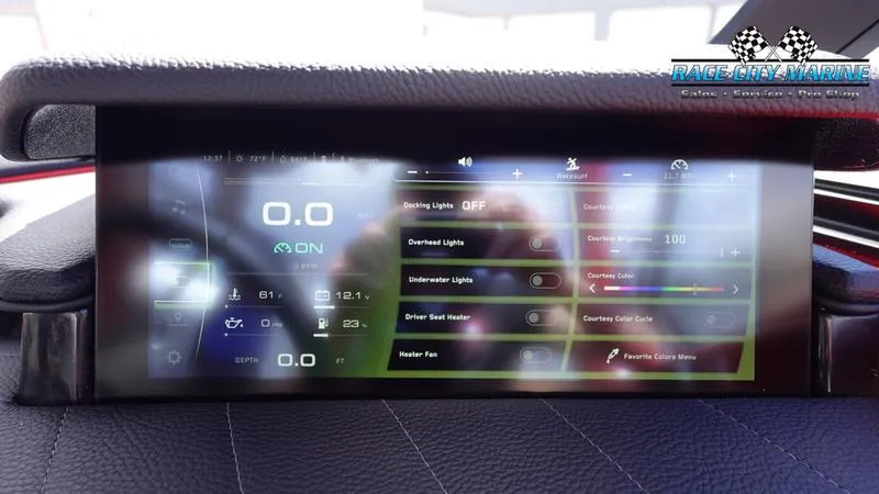 Slide: The Image of 2024 Nautique Super Air Nautique G23 dashboard display showing various boat controls and settings. - 11
