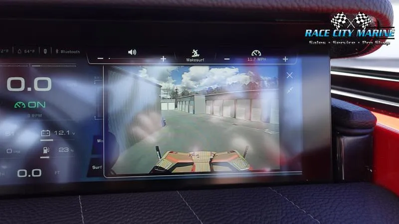 Slide: The Image of 2024 Nautique Super Air Nautique G23 dashboard display with rearview camera. - 23