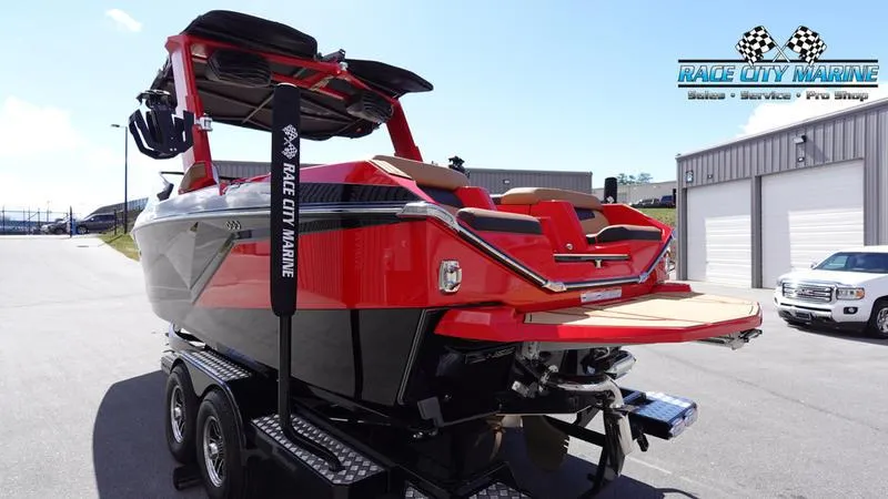 Slide: The Image of 2024 Nautique Super Air Nautique G23 boat on trailer at Race City Marine. - 28