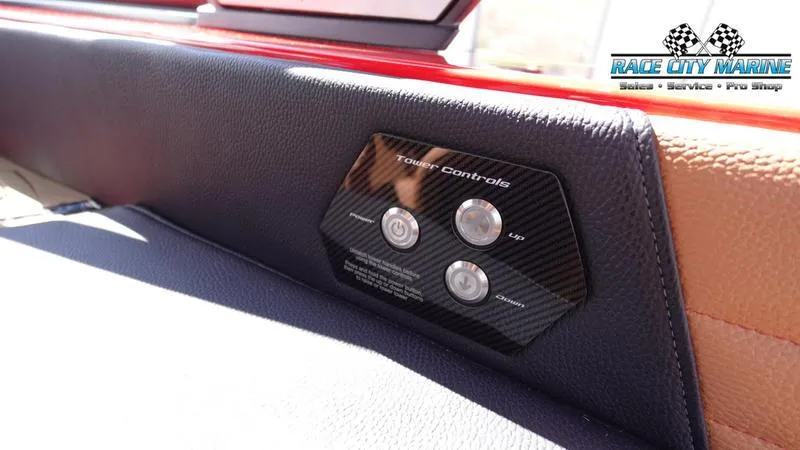 Slide: The Image of 2024 Nautique Super Air Nautique G23 tower controls panel, Race City Marine logo. - 3
