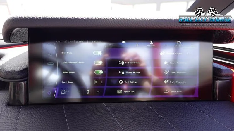 Slide: The Image of 2024 Nautique Super Air Nautique G23 touchscreen control panel displaying various boat settings. - 31