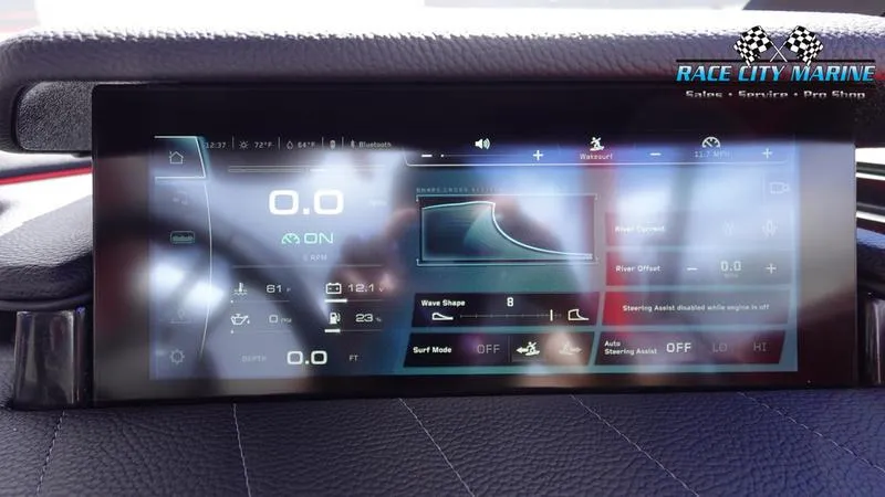 Slide: The Image of 2024 Nautique Super Air Nautique G23 dashboard display with advanced controls. - 44