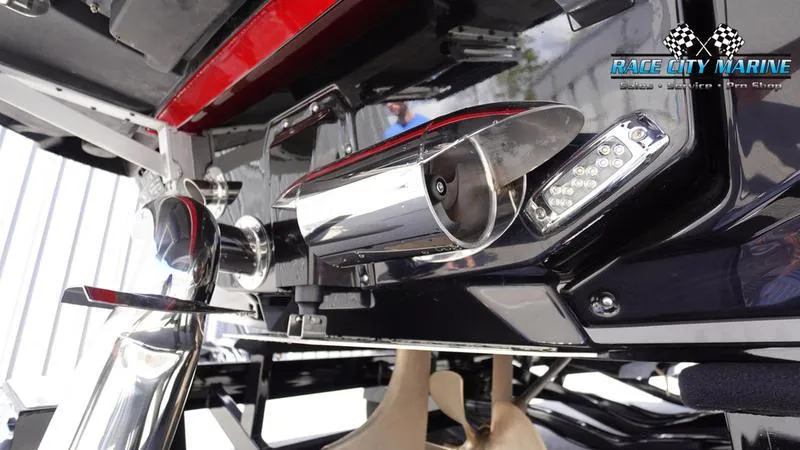 Slide: The Image of Close-up of the 2024 Nautique Super Air Nautique G23 boat's exhaust and underwater lighting system. - 47