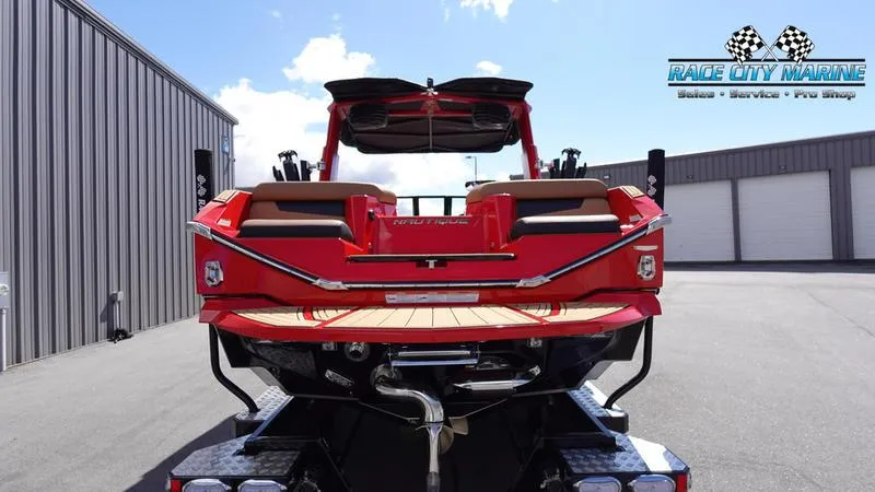 Slide: The Image of 2024 Nautique Super Air Nautique G23 boat at Race City Marine dealership. - 8