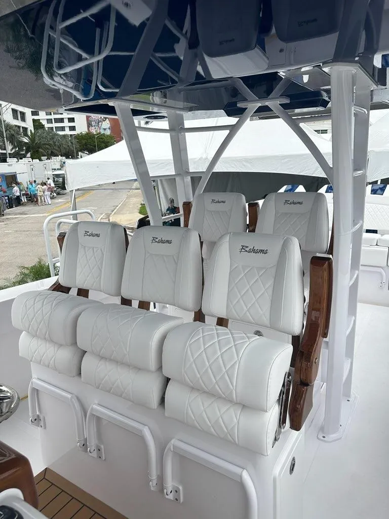 Slide: The Image of 2024 Bahama 41' Open Fisherman GT boat with luxurious white seating. - 11