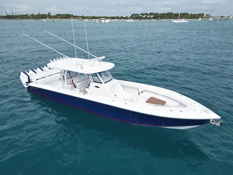 Slide: The Image of 2024 Bahama 41' Open Fisherman GT boat on the water. - 2