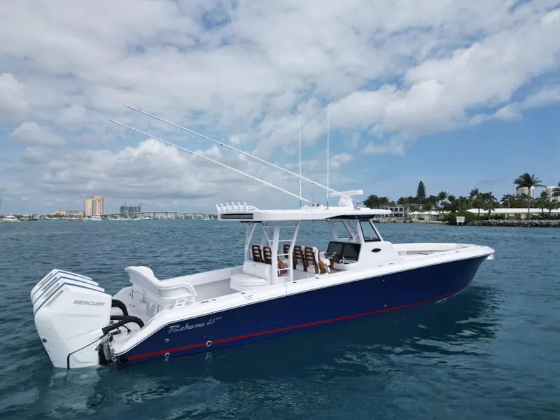 Slide: The Image of 2024 Bahama 41' Open Fisherman GT boat on the water with Mercury engines. - 3
