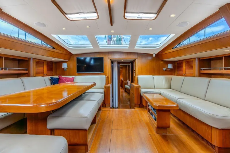 Slide: The Image of Luxurious interior of 2005 Nautor Swan 82S yacht with skylights and wooden furnishings. - 14