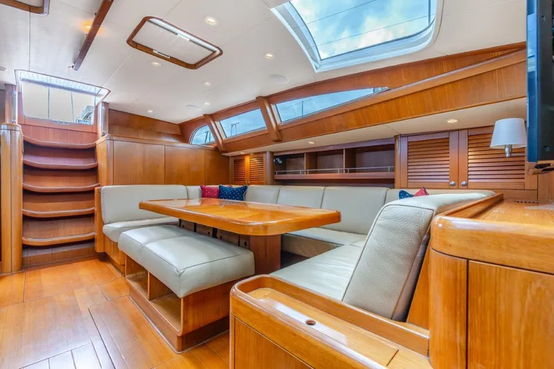 Slide: The Image of Luxurious interior of 2005 Nautor Swan 82S yacht with wooden finishes and skylights. - 15
