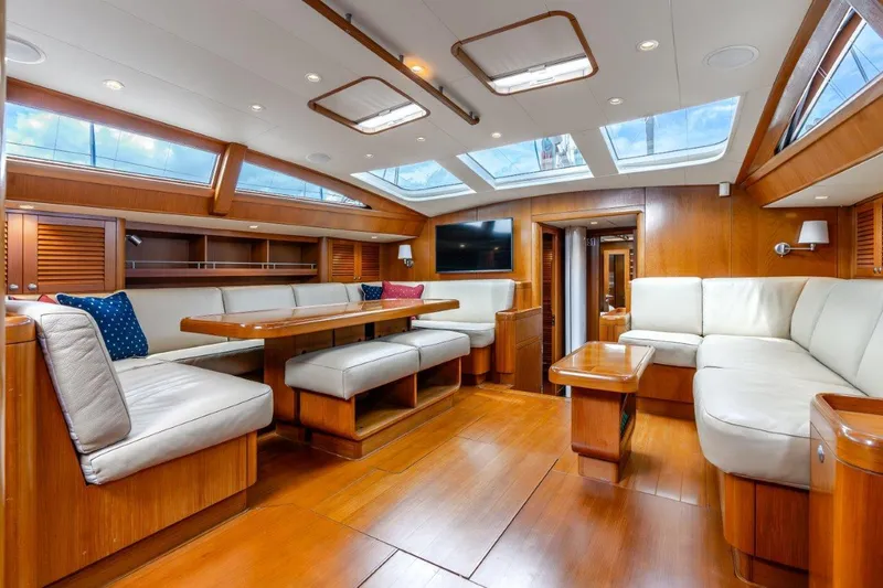 Slide: The Image of Luxurious interior of 2005 Nautor Swan 82S yacht with skylights and wooden furnishings. - 16
