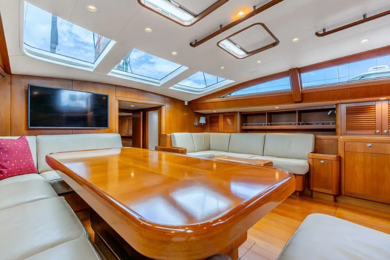 Slide: The Image of Luxurious interior of 2005 Nautor Swan 82S yacht with skylights and wooden furnishings. - 17